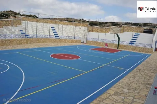 Constructing a multi-court for the Elementary school at Leipsoi Islands, in cooperation with the non